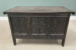 ANTIQUE STYLE OAK COFFER, moulded edge three plank lift-up top, carved initials and date, roundel