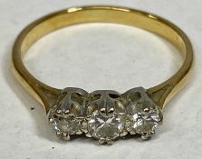 18CT GOLD THREE STONE DIAMOND RING, claw set inline coronet mount, 0.29ct approx. collective