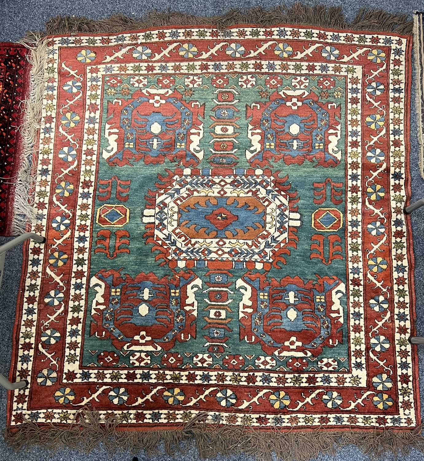 AFGHAN BLUE & RED GROUND HANDMADE WOOL RUG, 180 x 164cms Provenance: deceased estate Conwy