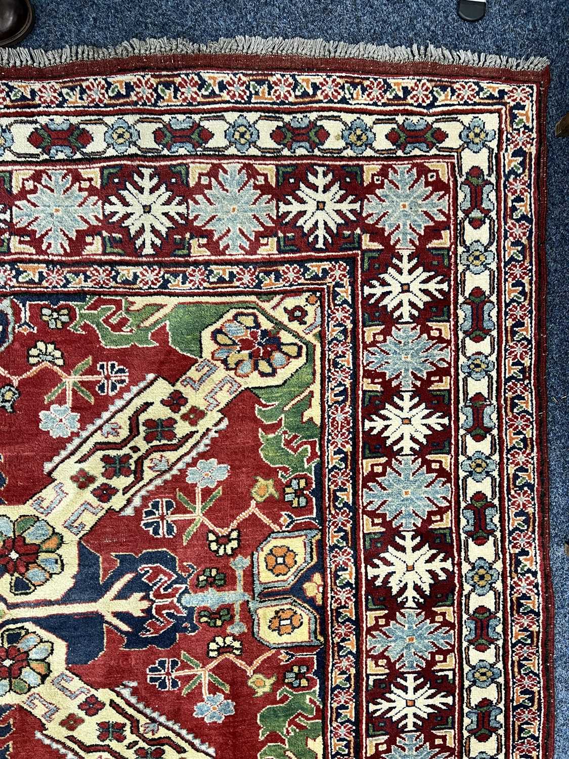 PERSIAN RED BLUE & CREAM GROUND HANDMADE WOOL RUG, floral border, 250 x 188cms Provenance: - Image 2 of 3