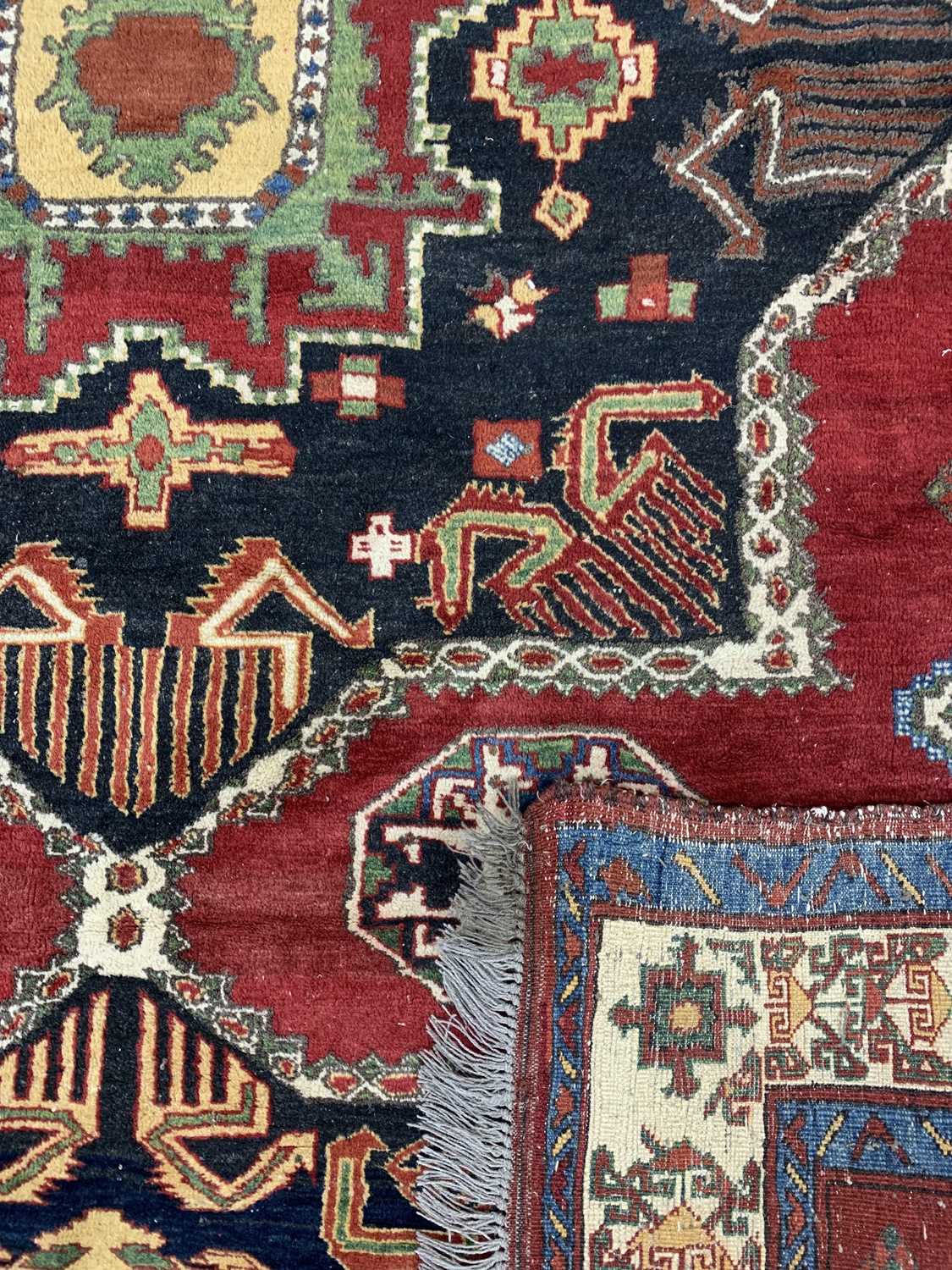 PERSIAN RED GROUND HANDMADE WOOL RUG, centre medallion, geometric border, 232 x 184cms Provenance: - Image 3 of 3