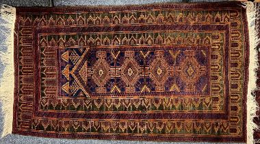 PERSIAN RED & BLUE GROUND HANDMADE WOOL RUG, 160 x 92cms Provenance: deceased estate Conwy