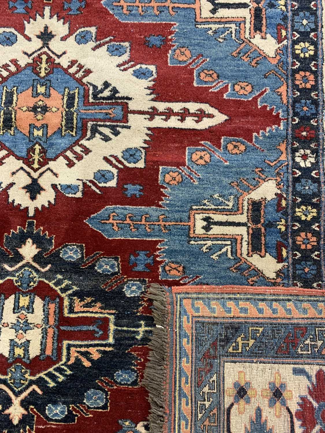 PERSIAN RED, BLUE & CREAM GROUND HANDMADE WOOL RUG, medallion centre, floral and geometric border, - Image 3 of 3