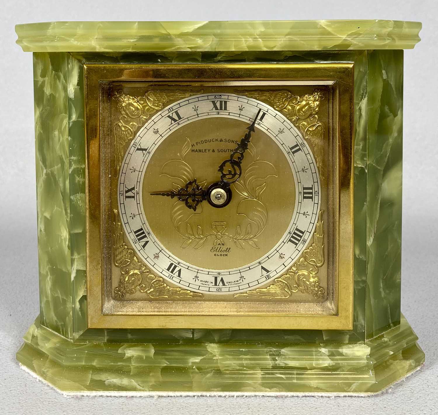 ELLIOTT ONYX CASED MANTEL CLOCK, the dial marked H Pidduck & Sons. Hanley and Southport, silvered