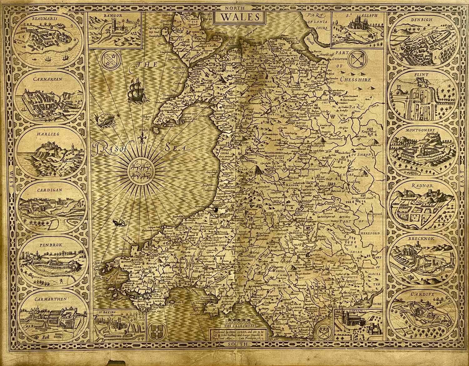 JOHN SPEED uncoloured engraved map of Wales, John Sudbury and George Humble, dated 1610, twelve oval