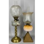 LATE 19TH CENTURY OIL LAMP with circular brass base and column, floral painted clear glass