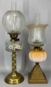 LATE 19TH CENTURY OIL LAMP with circular brass base and column, floral painted clear glass