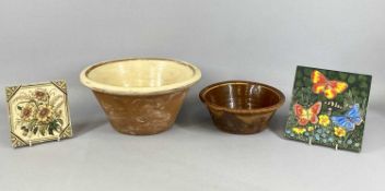 MID 19TH CENTURY POTTERY GROUP, slip glazed terracotta dairy bowl, 34cms (diam.), Buckley-type