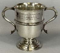 LARGE SILVER PRESENTATION CUP, twin handled, short pedestal circular base, inscribed to the front '