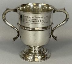 LARGE SILVER PRESENTATION CUP, twin handled, short pedestal circular base, inscribed to the front '