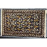 PERSIAN BLUE GROUND HANDMADE WOOL RUG, multiple medallion centre, geometric border, 126 x 80cms