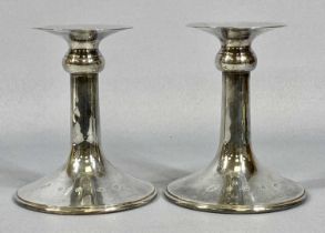 PAIR OF ELIZABETH II SILVER CANDLESTICKS plain contemporary design, flared drip pans, spreading
