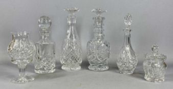 COLLECTION OF CUT GLASSWARE, four decanters and stoppers, 29cms (h) the tallest, candle holder