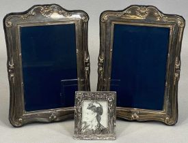 HALLMARKED SILVER PHOTOGRAPH FRAMES, a pair plus one other silver plated example, Sheffield 1993,