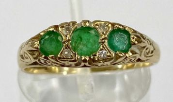 9CT GOLD EMERALD & DIAMOND SEVEN STONE RING, Celtic style scroll setting, size P, Birmingham date