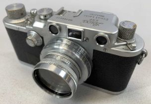 GROUP OF CAMERAS comprising Leica B.R.P Leizt Vetzlar No. 366417 in leather case, a Nikon
