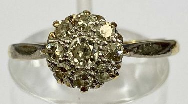 18CT GOLD & PLATINUM DIAMOND FLORAL CLUSTER RING, central 0.25ct round brilliant surrounded by eight