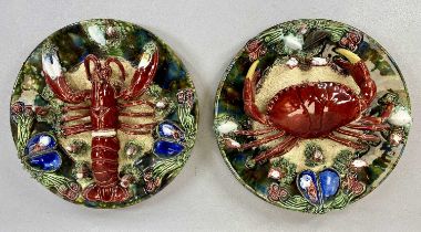 PAIR OF ALVARO JOSE CALDAS DA RAINHA PALISSY WARE DISHES decorated in relief with crab and a lobster