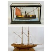 SCRATCH BUILT PAINTED WOODEN MODEL OF H.M.S STORMCOCK, in glazed case, 38 (h) x 60.5 (w) x 25cms (d)