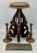 EASTERN HARDWOOD CARVED FISH TRIPOD TABLE ETC 52cms tall, a pair of open twist treen candlesticks,