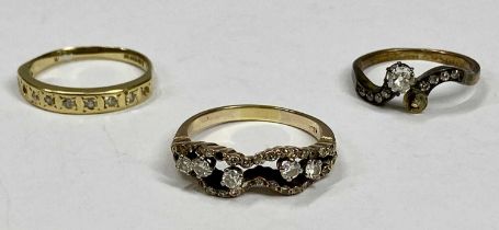 THREE 18CT GOLD DIAMOND SET DRESS RINGS, each has one or more stones missing, inline 7 stones