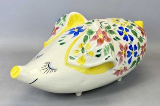 LARGE ARTHUR WOOD PIGGY BANK IN THE FORM OF WHIMSICAL PIG, with blue, pink and yellow floral