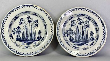 ENGLISH DELFT BLUE & WHITE CHARGERS, A PAIR - late 18th century, probably London, painted to the rim