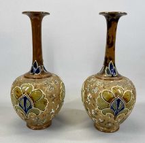 A PAIR OF DOULTON SLATERS PATENT VASES with slender necks and bulbous bodies with incised stylised