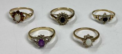 FIVE 9CT GOLD DRESS RINGS, opal and white pastes, size K, sapphire and pastes, size M, sapphire