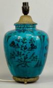 PERSIAN TURQUOISE GLAZED EARTHENWARE VASE, of baluster form, decorated with fish and flowers, gilt