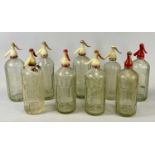 NINE VINTAGE GLASS SODA SYPHONS, facet and ribbed glass, etched advertising detail, Hooper Struve,