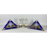 PAIR OF CONTINENTIAL CANDLESTICKS & TWO DIAMOND SHAPE STAINED GLASS WINDOW PANELS, 24cms (h), 13 x