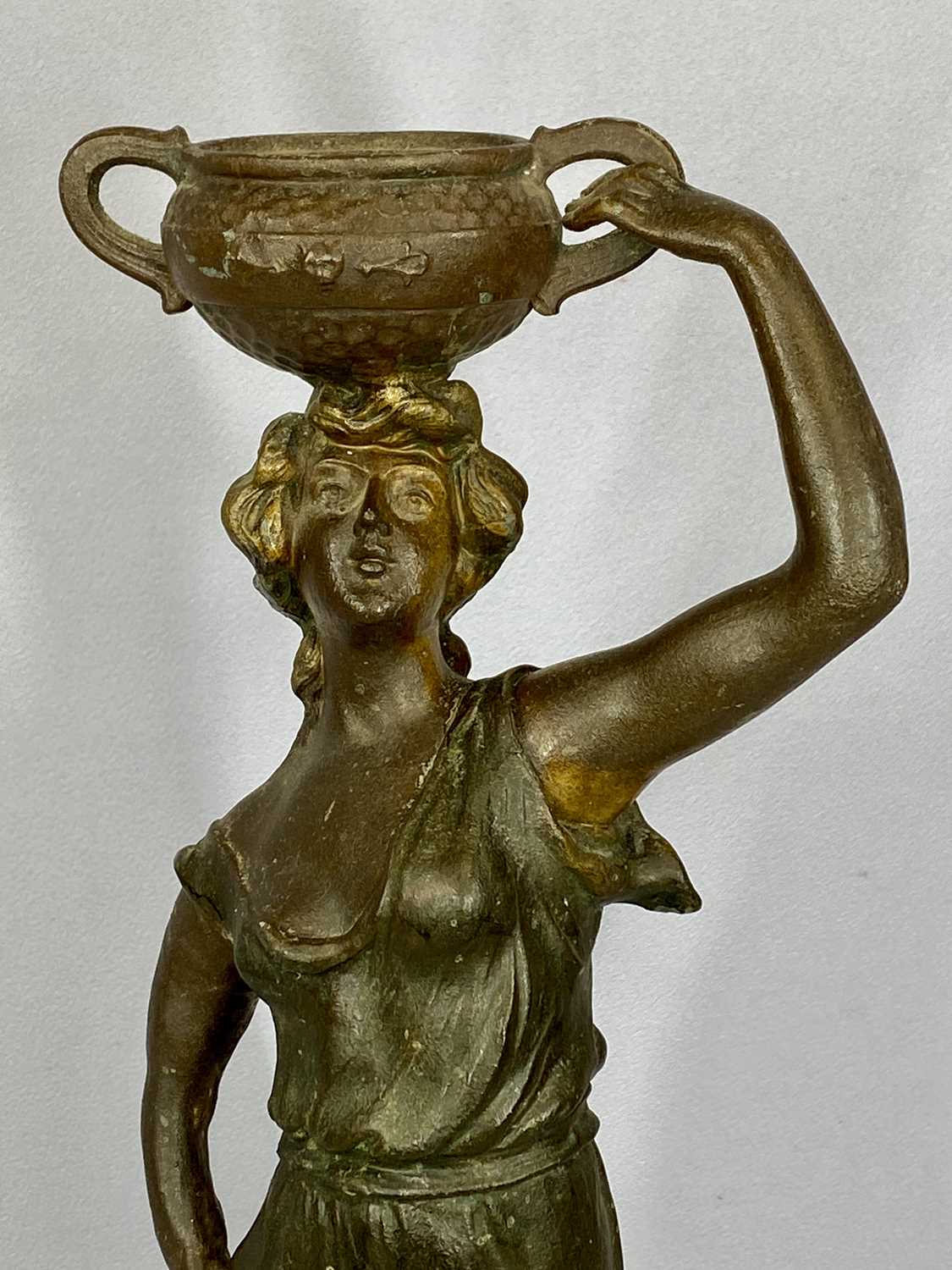 BRONZED SPELTER FIGURE of a lady holding two handled pot aloft, oval ebonised plinth, 63cms (h) - Image 2 of 3
