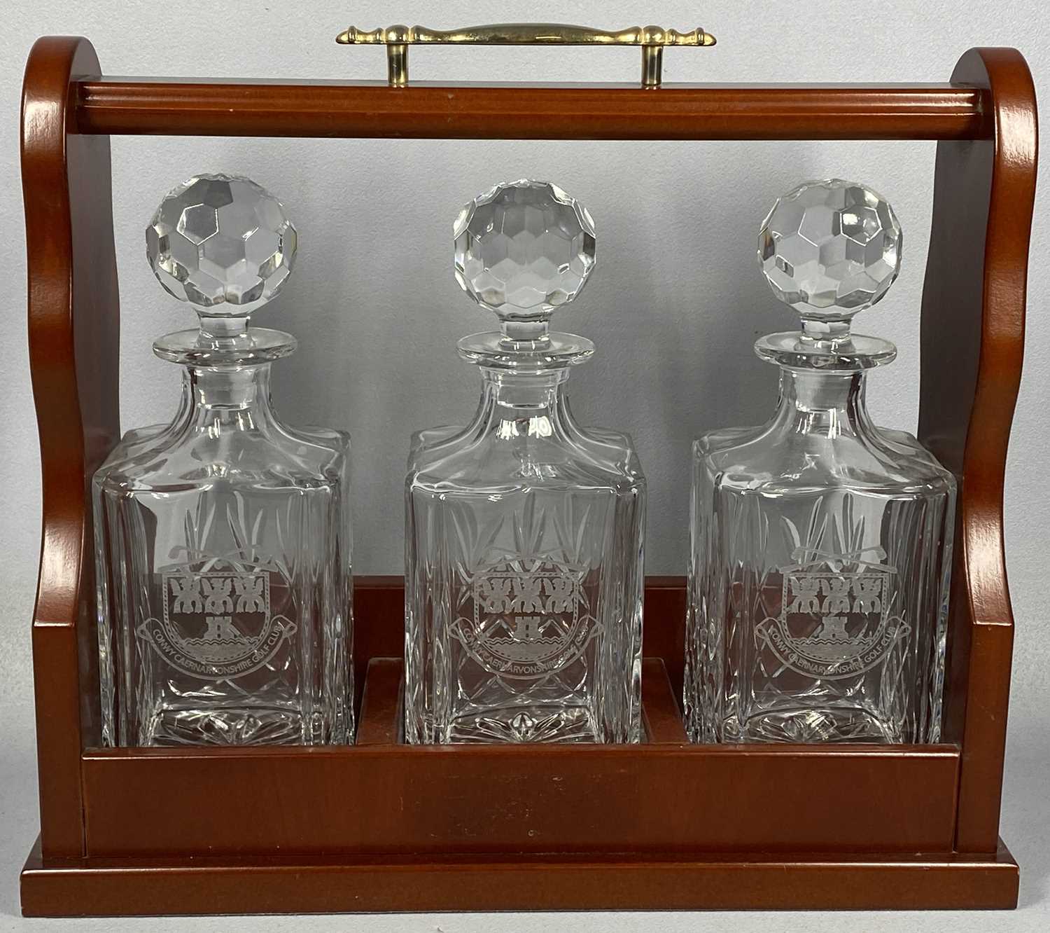 CERAMCS & REPRODUCTION MAHOGANY TANTALUS containing three square cut glass decanters and stoppers, - Image 2 of 5