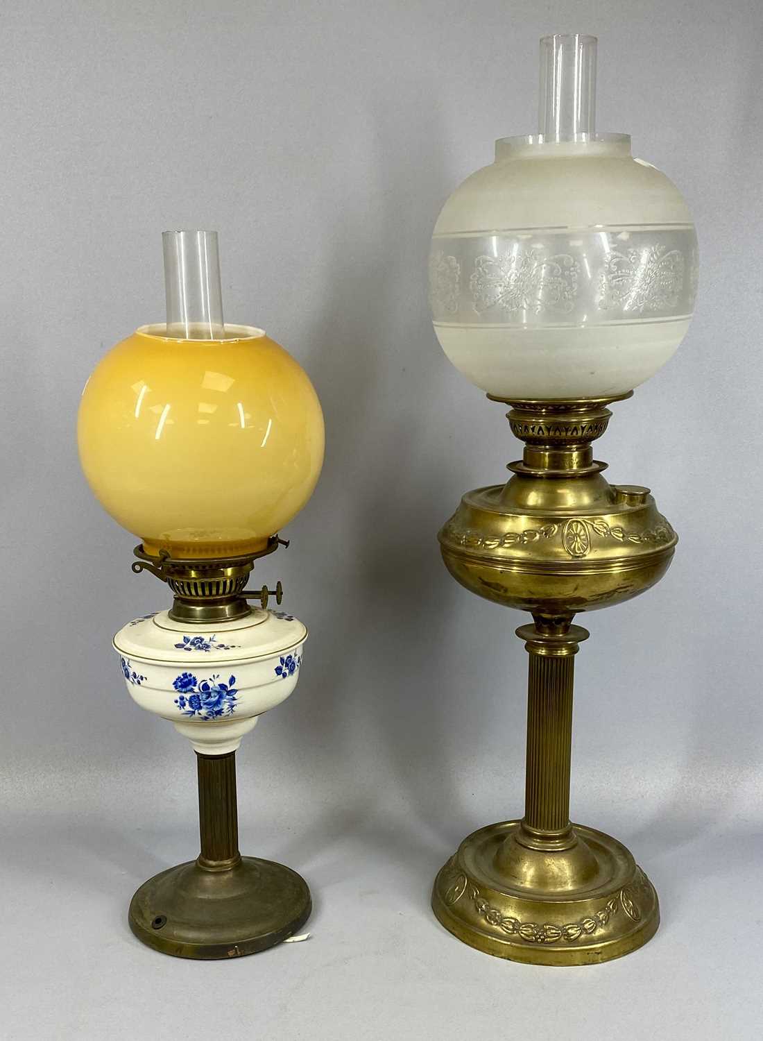 VICTORIAN BRASS OIL LAMP & ANOTHER, embossed with swags to the base and reservoir, veritas single