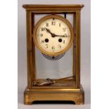 JAPY FRERES 19TH CENTURY GILDED BRASS CASED MANTEL CLOCK, with mercury pendulum, circular dial