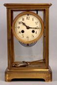 JAPY FRERES 19TH CENTURY GILDED BRASS CASED MANTEL CLOCK, with mercury pendulum, circular dial