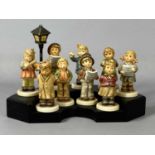 HUMMEL FIGURINES CHOIR (9), First Solo, Hitting the High Note, Keeping Time, Lamp Light Caroller,