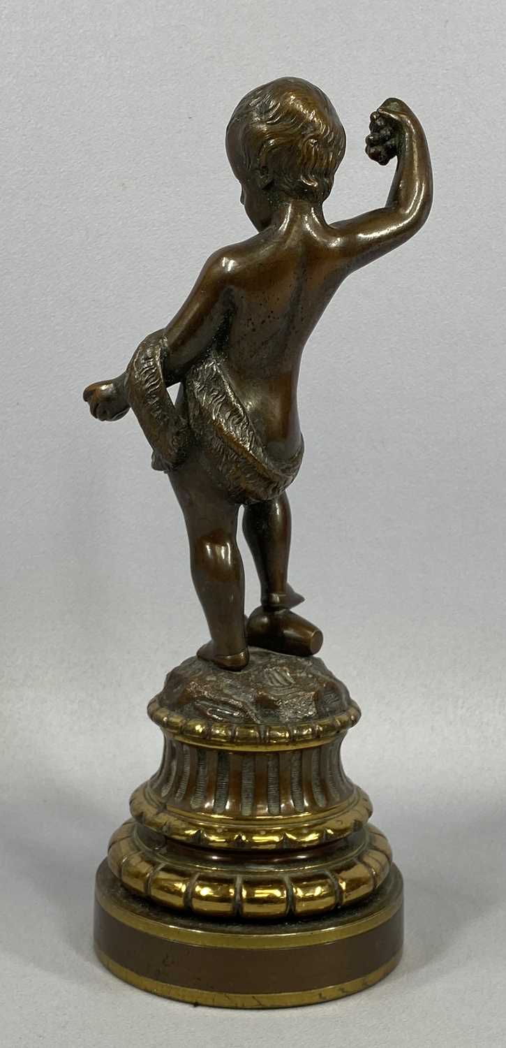 BRONZED FIGURINE OF A CHILD HOLDING GRAPES, 20th century, unsigned, gilt highlighted stepped - Image 3 of 4