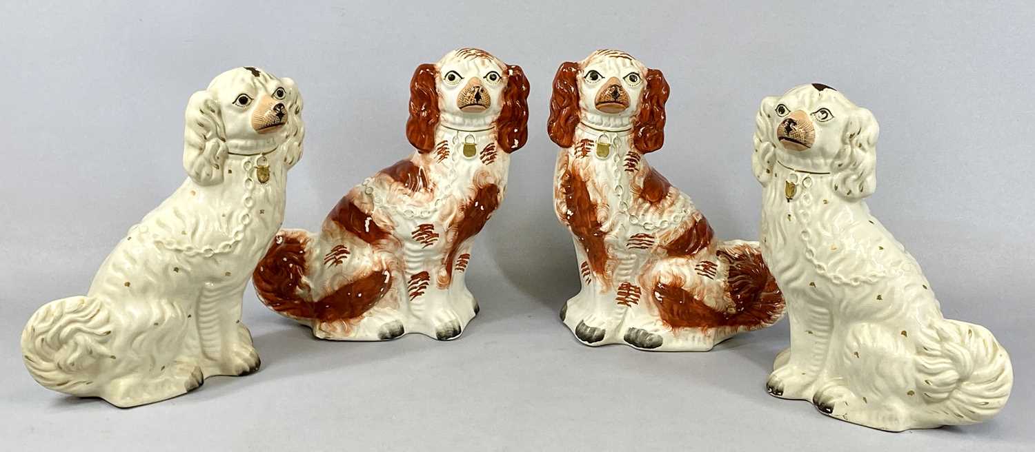 TWO PAIRS OF STAFFORDSHIRE POTTERY DOGS, red and white pair, 31cms (h), gilt and white pair,