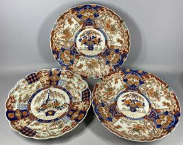 THREE JAPANESE IMARI CHARGERS, late 19th/early 20th century, a pair and one similar, with lobed