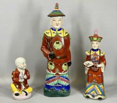 CHINESE STATUES (3), Earthenware figure of a Mandarin dignitary, colourful polychrome decoration,