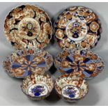 GROUP OF JAPANESE IMARI comprising circular chargers, late 19th/early 20th century, a pair with