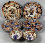 GROUP OF JAPANESE IMARI comprising circular chargers, late 19th/early 20th century, a pair with