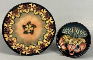 TWO MOORCROFT ITEMS comprising circular Centenary 1997 pin-dish, 12cms (diam.), and circular dish