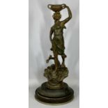 BRONZED SPELTER FIGURE of a lady holding two handled pot aloft, oval ebonised plinth, 63cms (h)