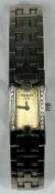 TISSOT LADIES DIAMOND BEZEL SET STAINLESS STEEL BRACELET WRISTWATCH, numbered to the case back