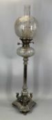 WALKER & HALL SILVER PLATED OIL LAMP, trefoil base, paw feet, stepped platform, three recumbent