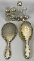 ELEVEN HALLMARKED SILVER DRESSING TABLE ITEMS, nine bearing various Birmingham hallmarks