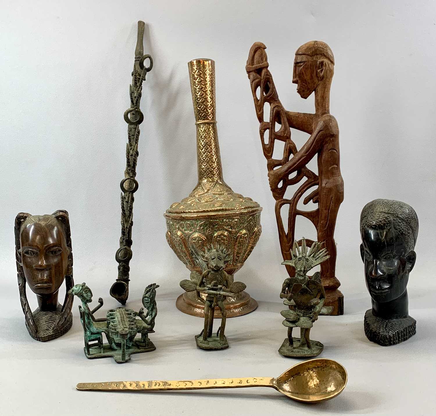 ITEMS OF ETHNOGRAPHIC INTEREST, including an African Senufo Chieftain's pipe, the wooden shaft set